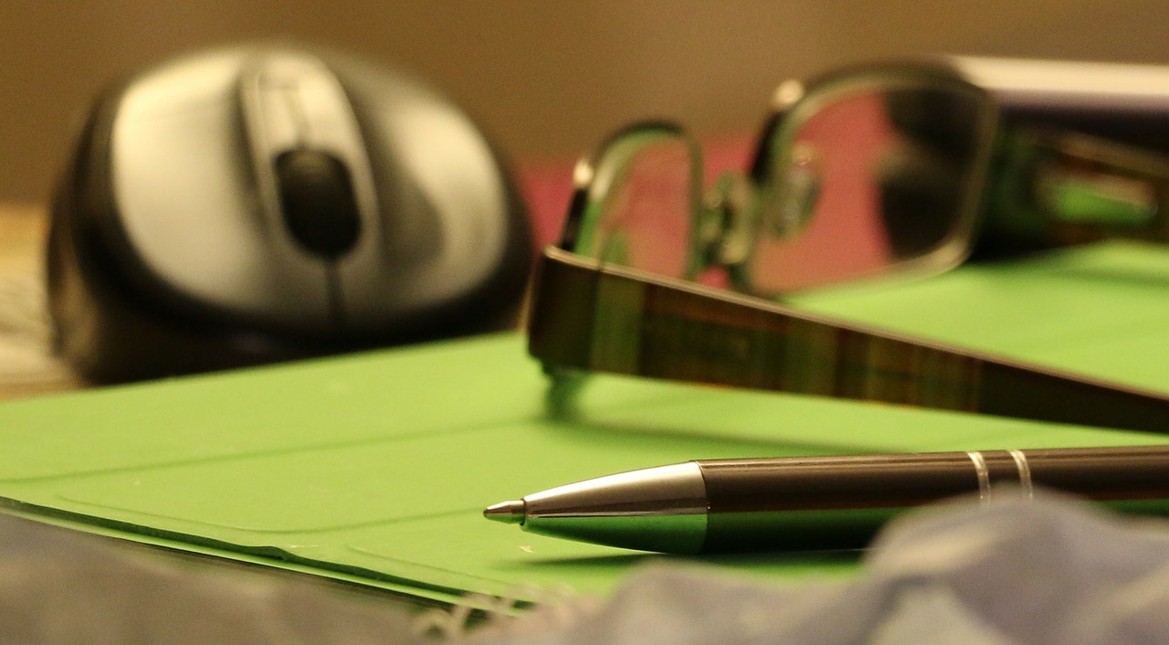 >Spectacle and A Pen
